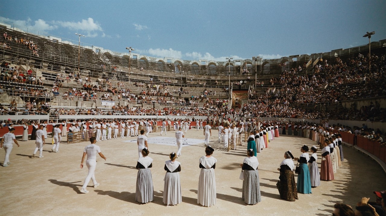 People gathered in a large, outdoor stadium