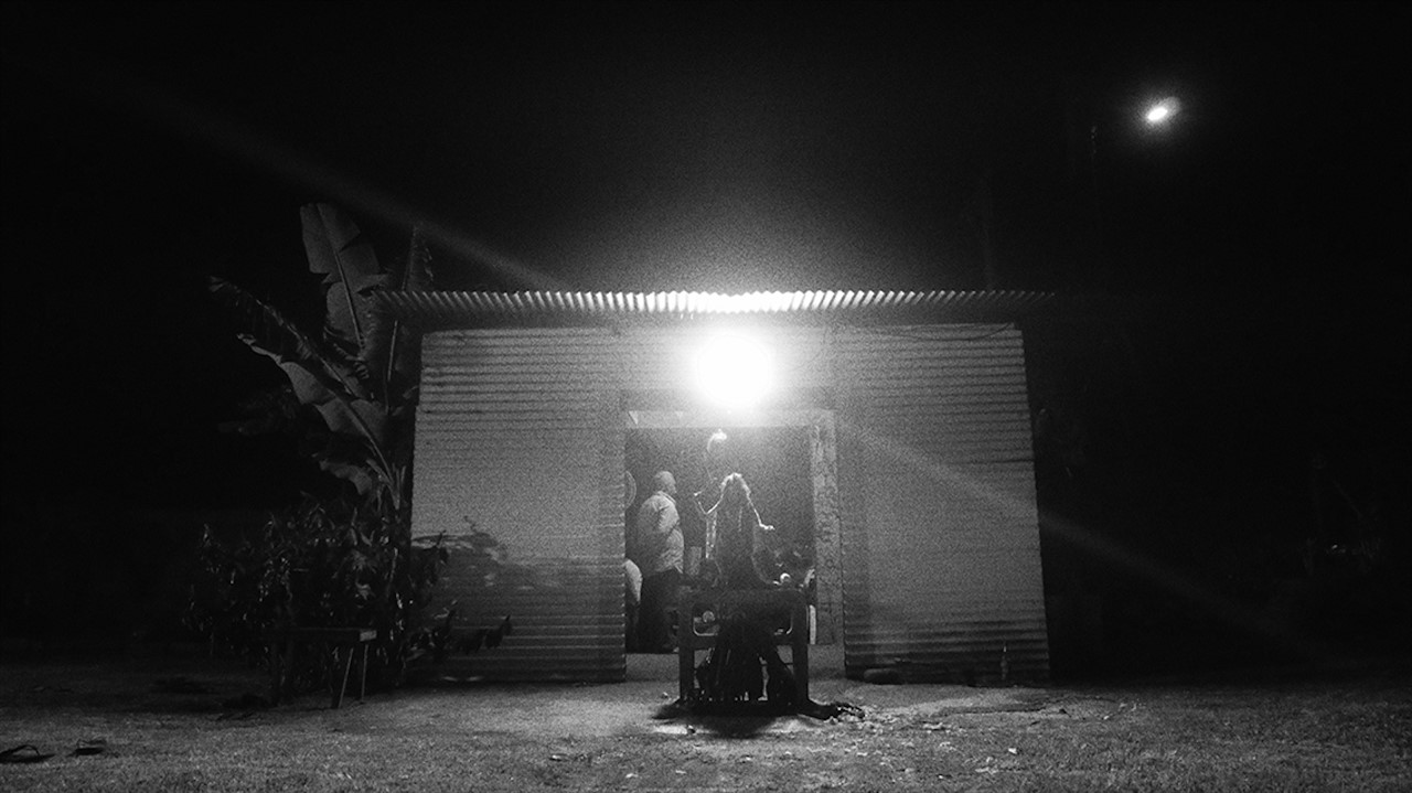 A tin structure at night