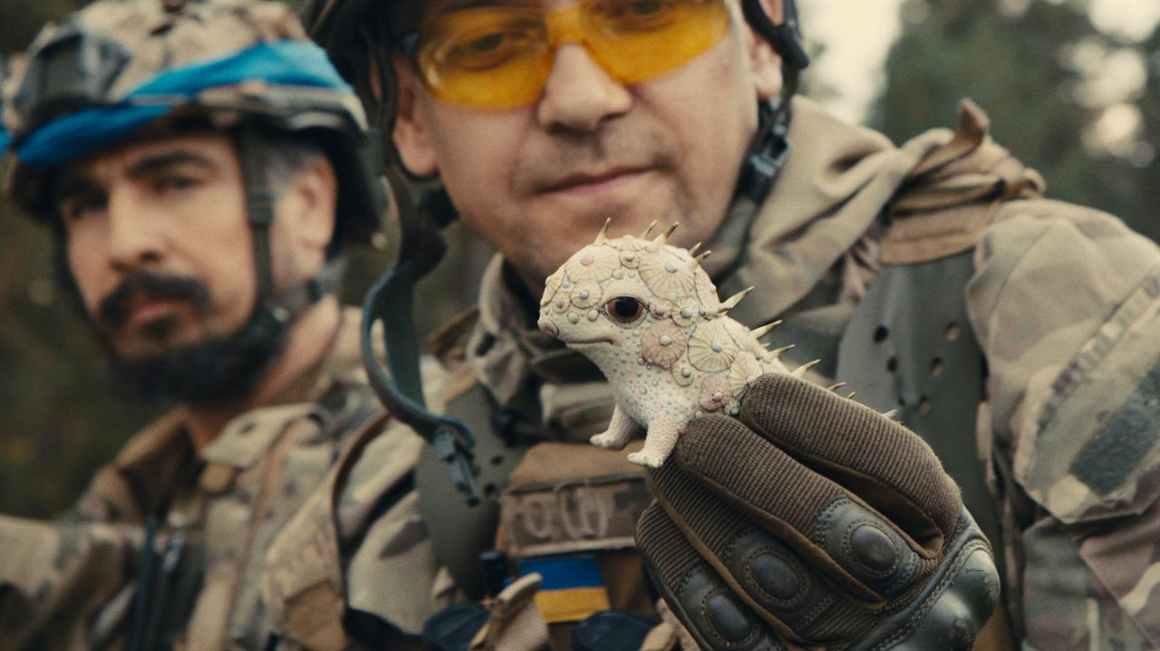 Soldier holding a delecate porcelain figurine